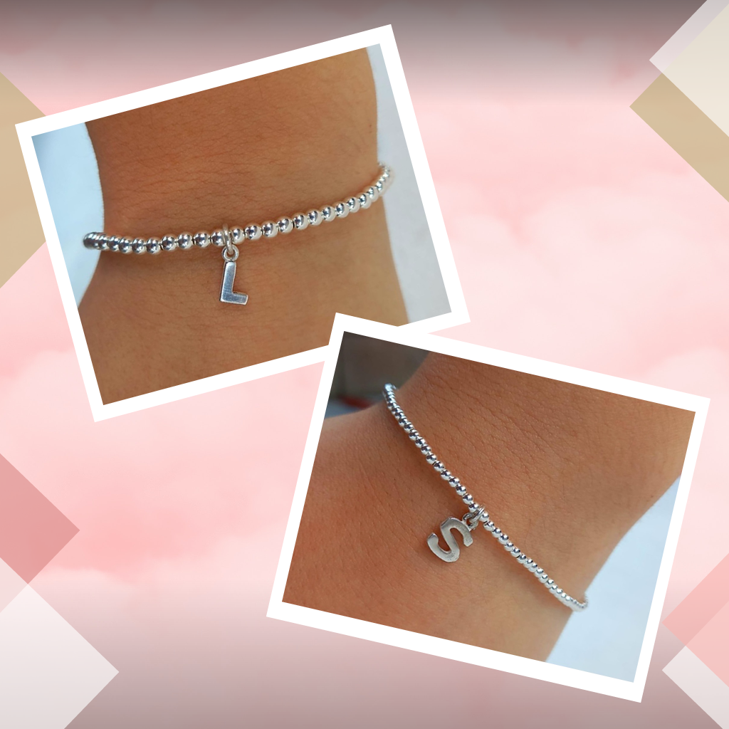 Pulsera elastizada bolitas con inicial. Plata 925