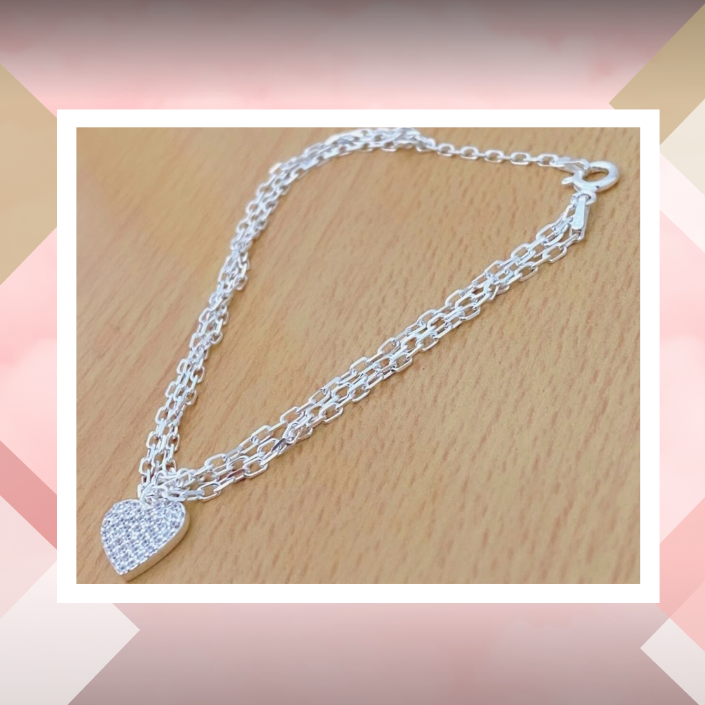 Pulsera triple cadena y dije corazón con micropave. Plata 925