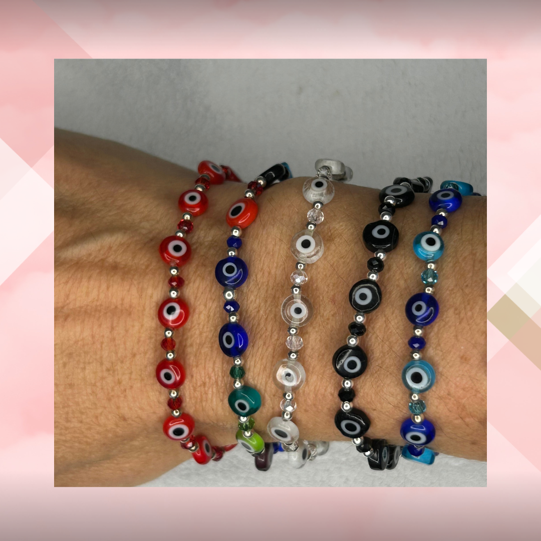 Pulsera elastizada ojo turco con cristal y bolitas. Plata 925