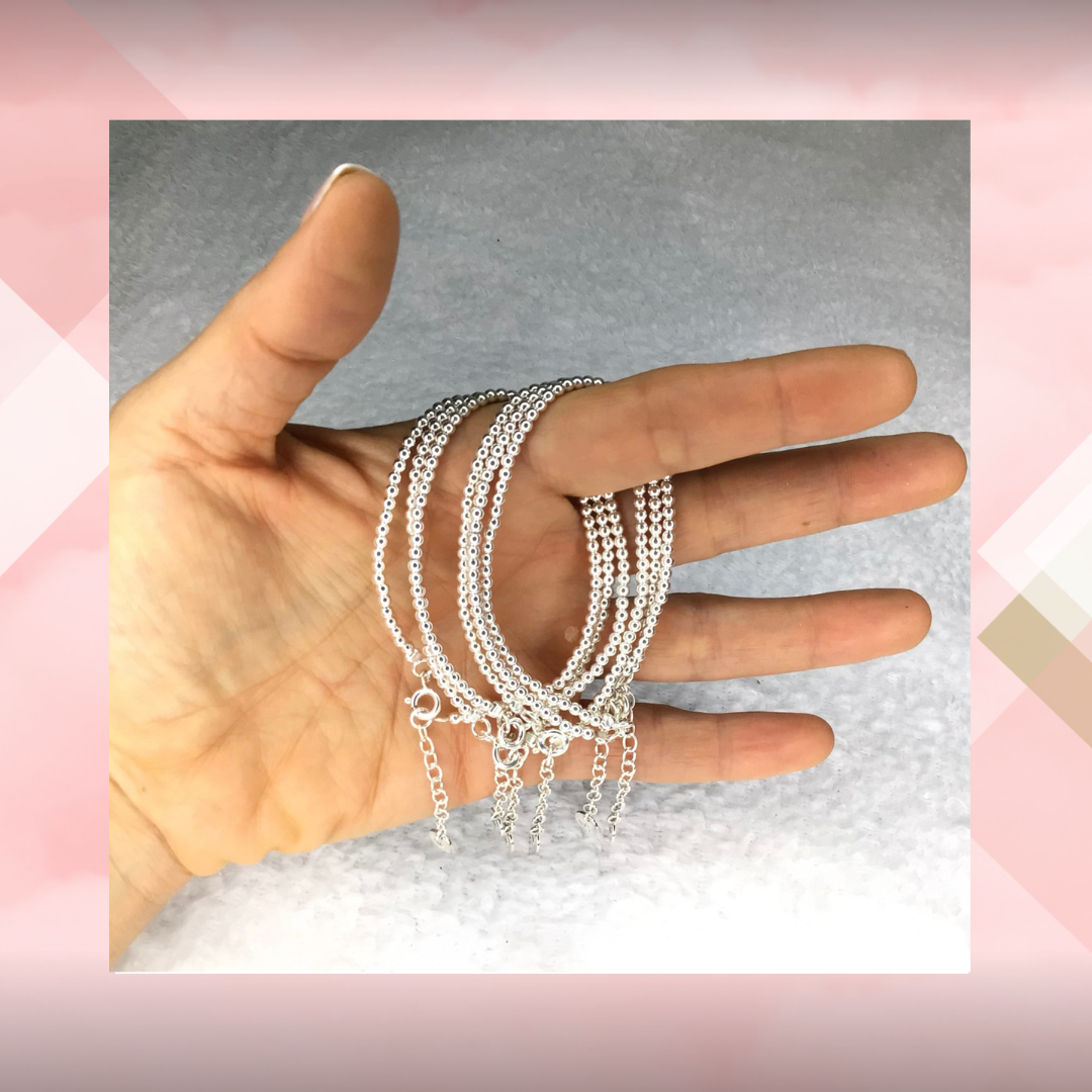 Pulsera bolitas con cadena regulable. Plata 925