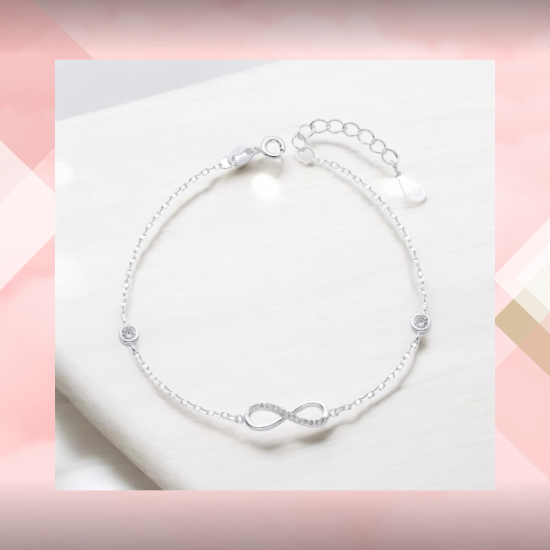 Pulsera con infinito y cubic con cadena extensible. Plata 925